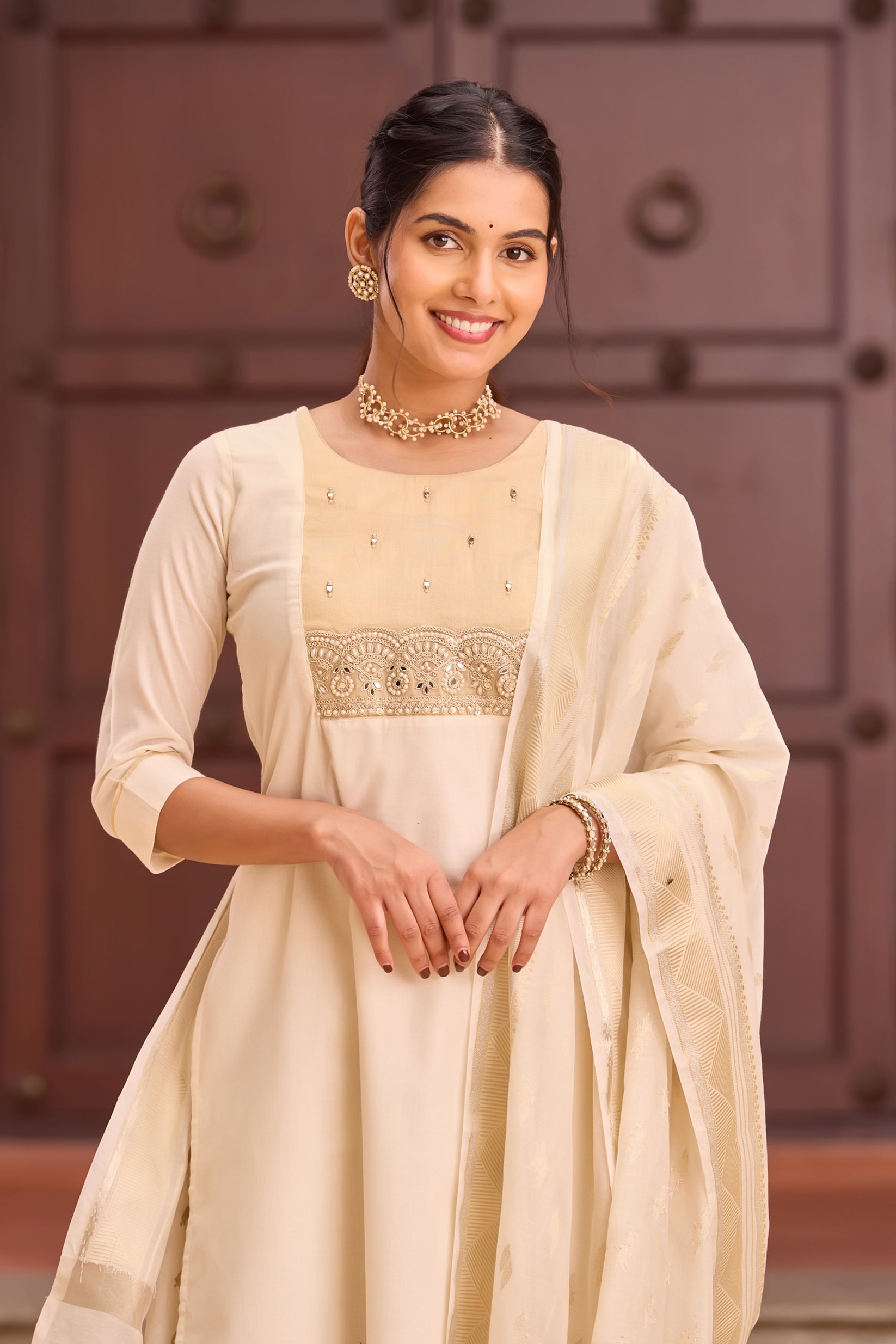 Off-White Mulmul Kurta Set with Kasavu Style Dupatta & Embellished Yoke