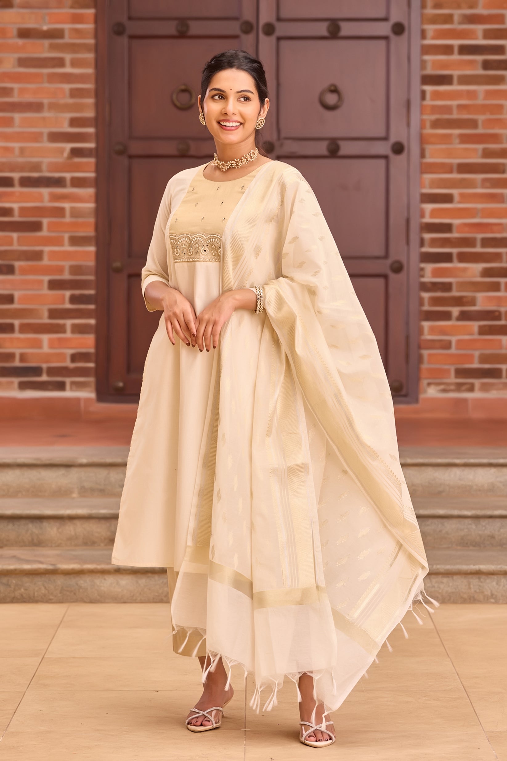 Off-White Mulmul Kurta Set with Kasavu Style Dupatta & Embellished Yoke