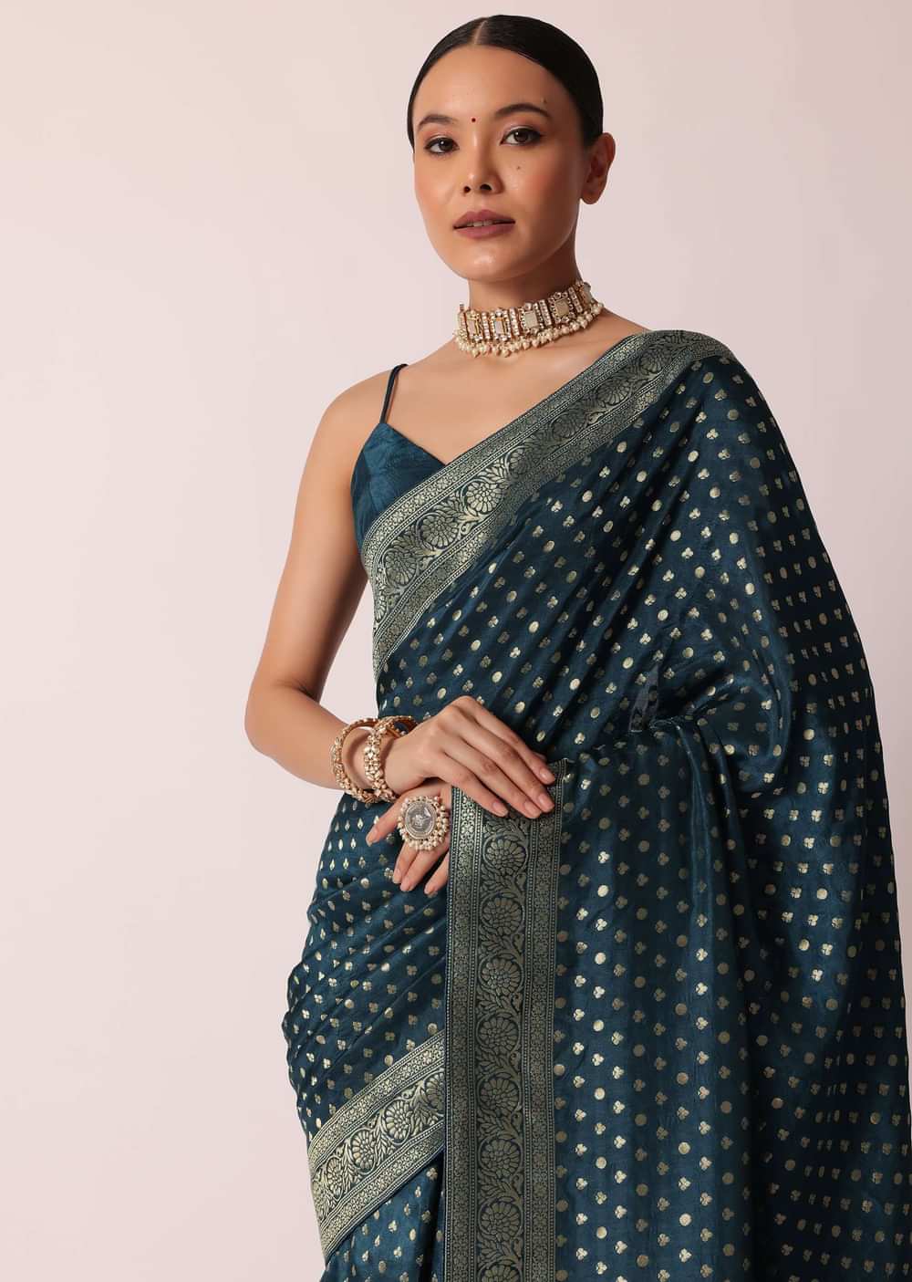 Teal Dola Silk Saree With Woven Zari Pallu And Unstitched Blouse Piece